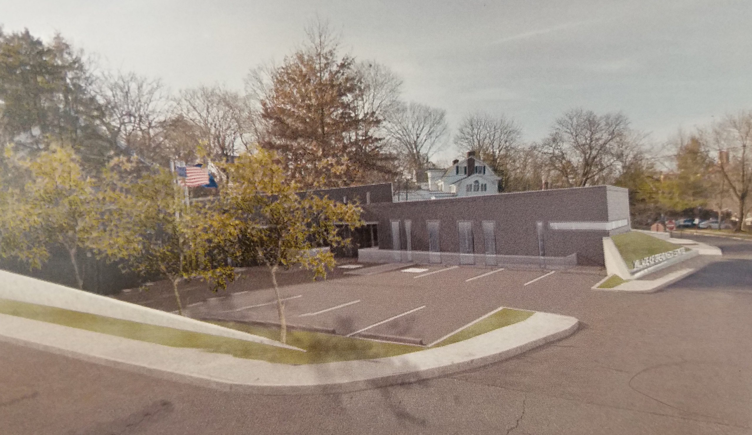 A rendering shows that the new village hall would be placed closer toward the commercial end of town, while the old village hall would remain atop the hill. (Photo courtesy of Narofsky Architecture)