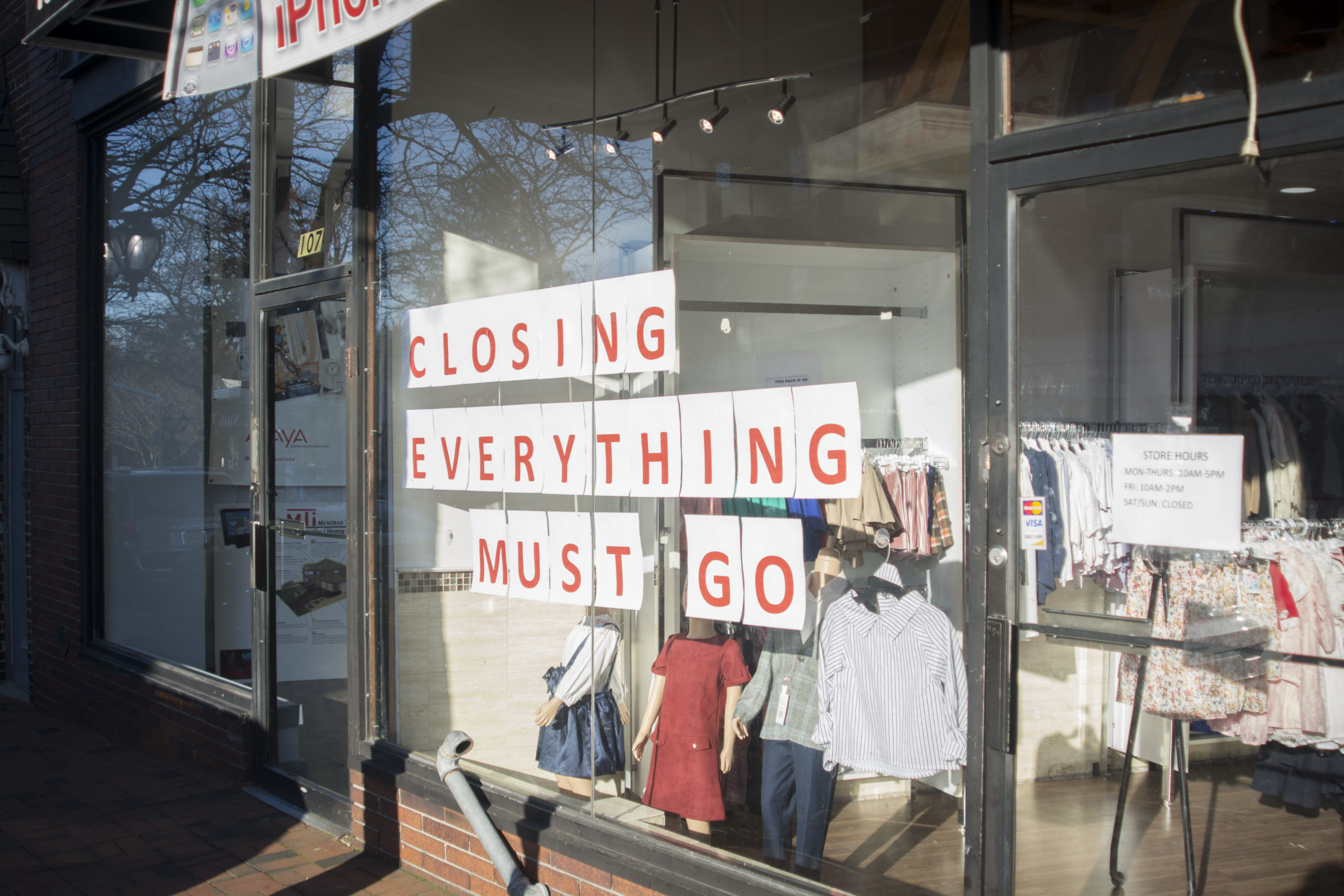 MMKidz, a clothing store that opened in Great Neck Plaza earlier this year, announced that it will be closing. (Photo by Janelle Clausen)