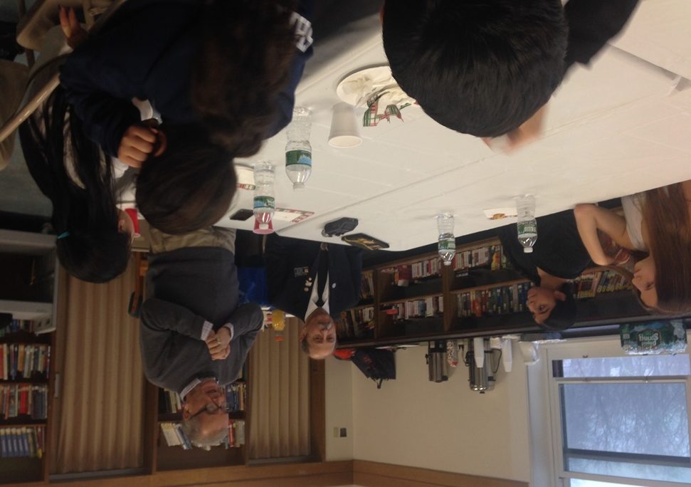 Richard S. Sherman Great Neck North Middle School students listen to wartime stories told by Commander of the Albertson VFW Post 5253 Jack Hirsch and Assemblyman Anthony D’Urso. (Photo courtesy of Assemblyman Anthony D'Urso's office)