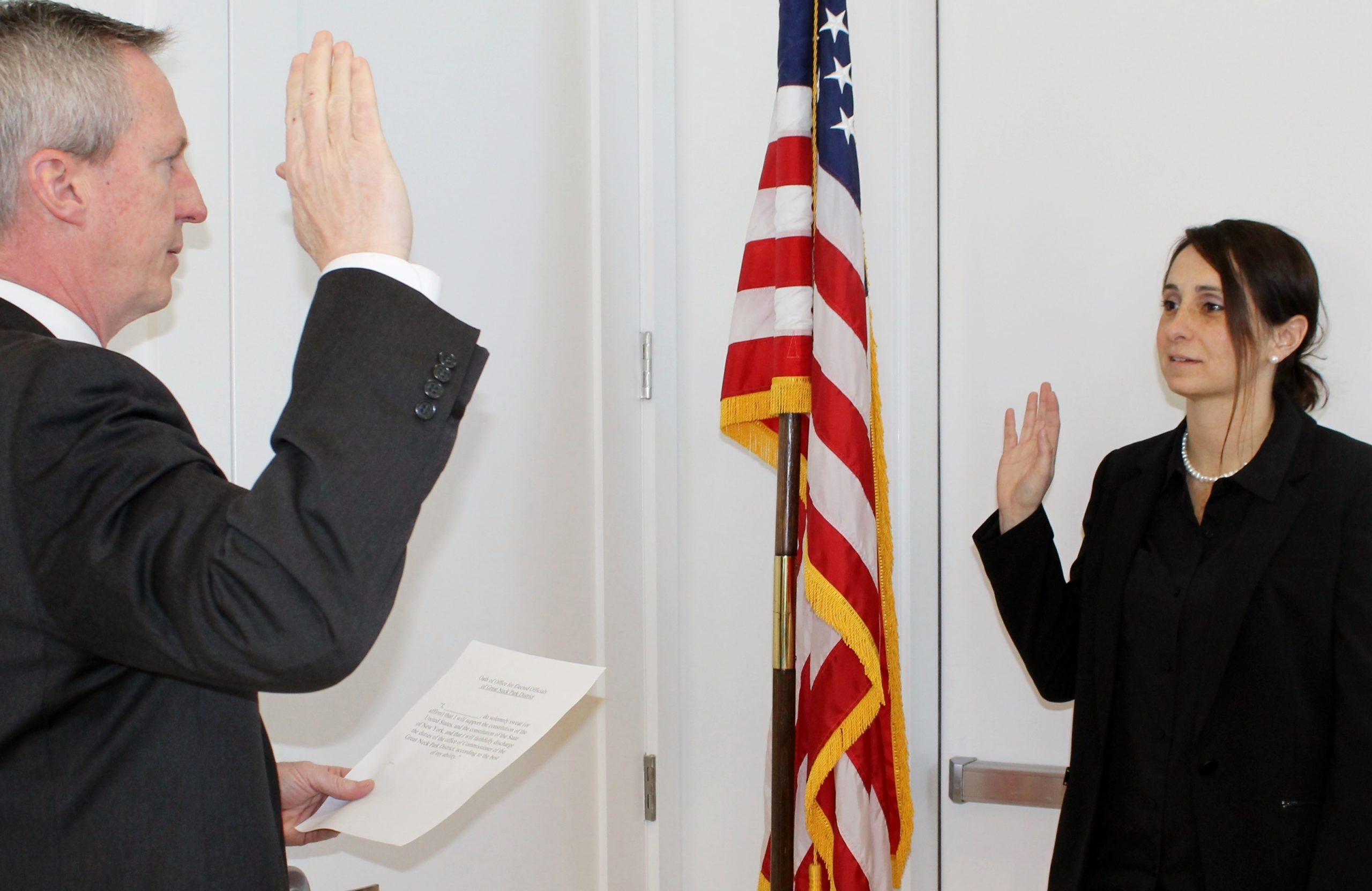 Christopher Prior swears in Tina Stellato as Park Commissioner. (Photo courtesy of the Great Neck Park Distriction)