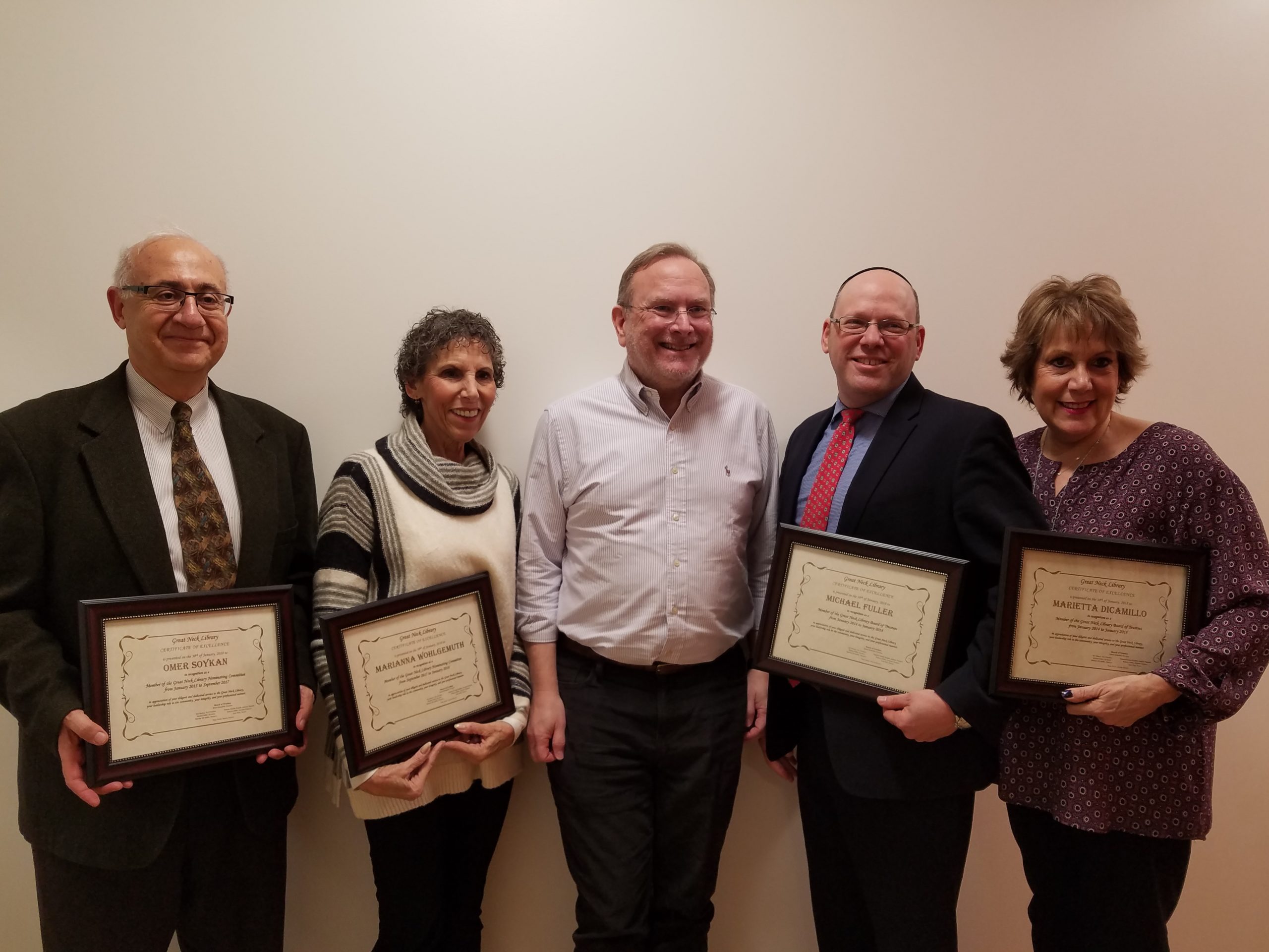 The Great Neck Library Board of Trustees held its annual Reorganization meeting on Jan. 30. Outgoing members were presented with certificates of recognition, including Omer Soykan, Marianna Wohlgemuth, Robert Schaufeld, Michael Fuller, and Marietta DiCamillo. (Photo courtesy of the Great Neck Library)