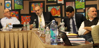 Roslyn school district assistant superintendent of business Joseph Dragone, second from left, discusses the proposed 2018-19 budget with the board of education. (Photo by Amelia Camurati)