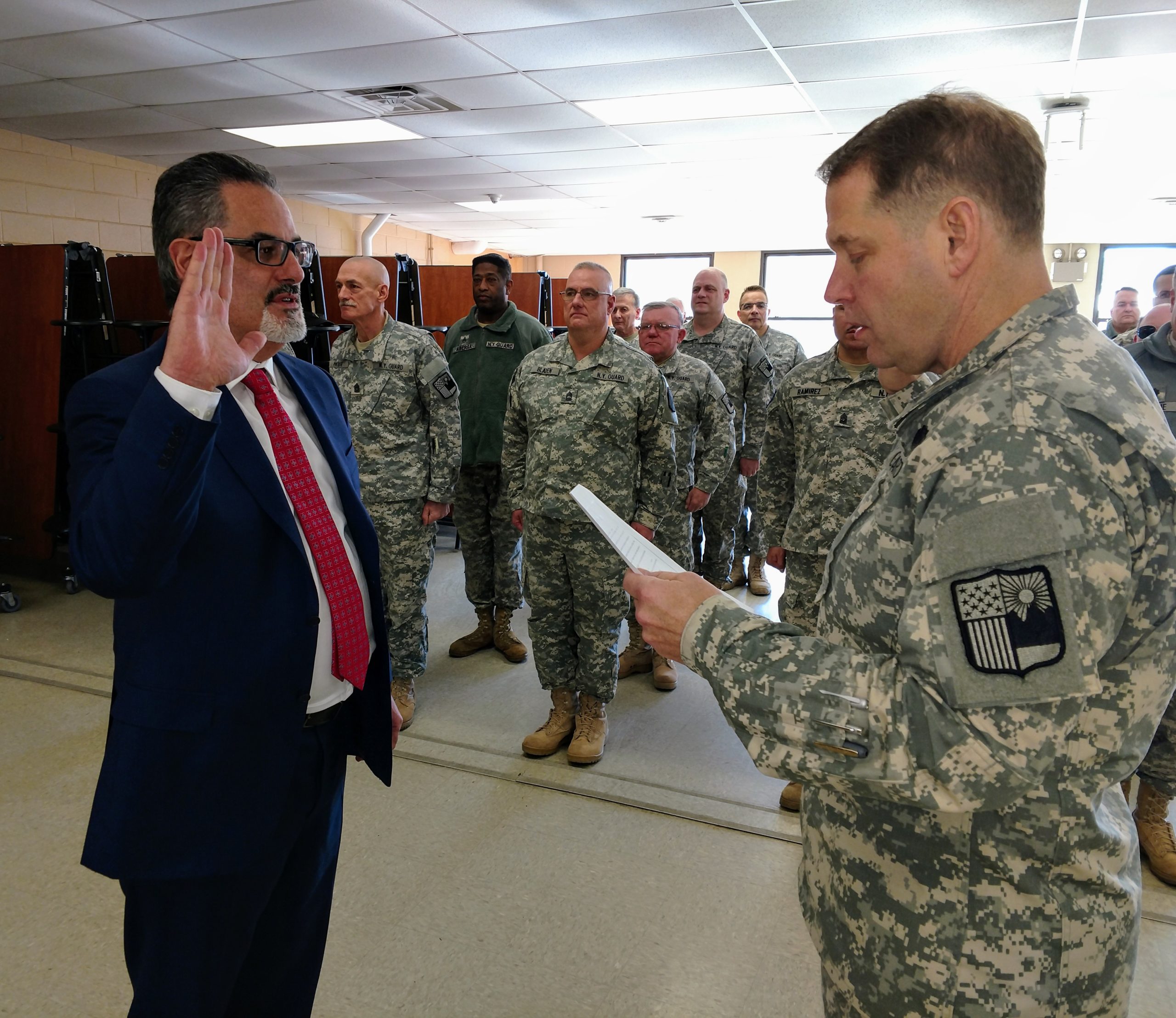 New York Guard Acting Commander Colonel David Warager swears in Robert Duarte of Northwell Health. (Photo by Capt. Mark Getman/New York Guard)