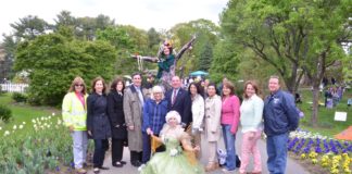 Fairies from the National Circus Project at the Clark Garden Spring Festival pose with local officials. (Photo courtesy of the Town of North Hempstead)