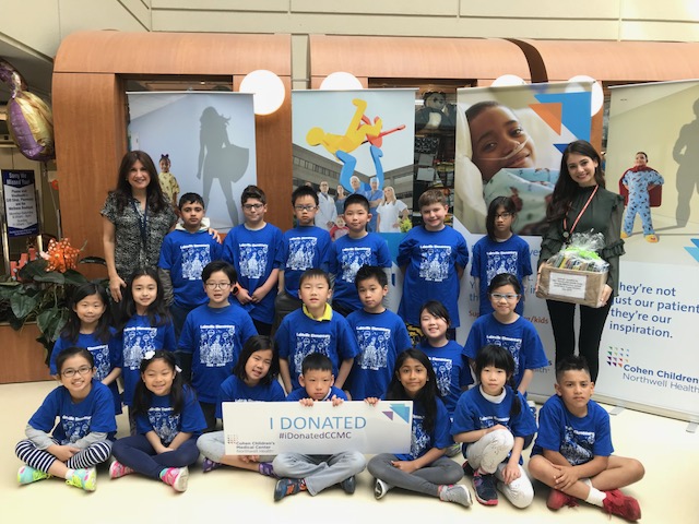 Students from Lakeville Elementary donated books to young patients at the Cohen Children's Medical Center. (Photo courtesy of the Great Neck Public Schools)