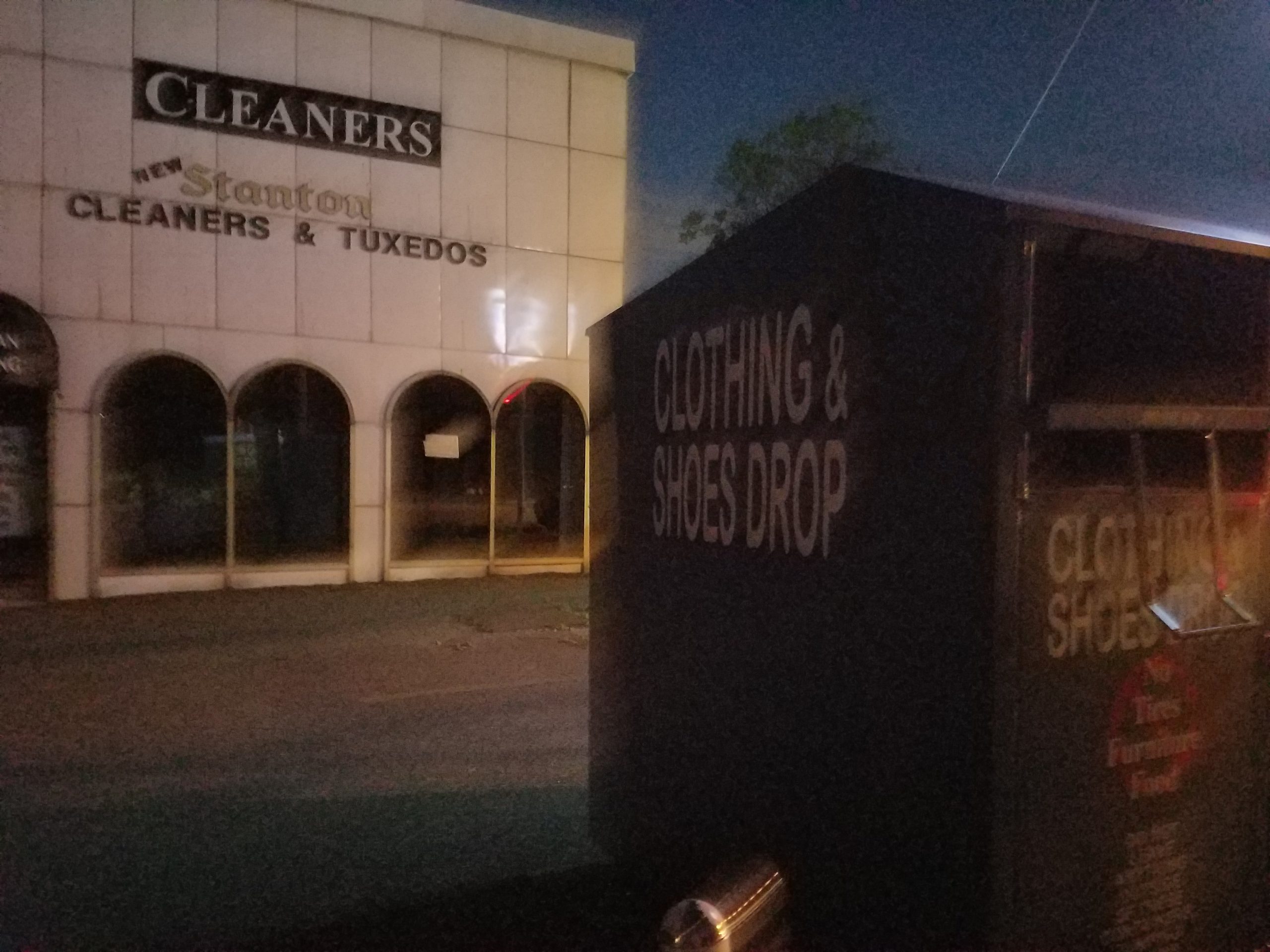 One of the collection bins that Great Neck Plaza trustees hope to regulate sits in front of the old Stanton Cleaners site at the end of Cuttermill Road. (Photo by Janelle Clausen)