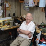 John Cinciripini, 83, said he will soon be retiring after nearly 50 years of working as a tailor in Great Neck. (Photo by Janelle Clausen)