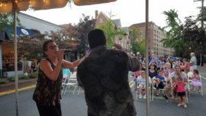 A duo performs before a live Great Neck Plaza audience. (Photo by Maylan L. Studart)