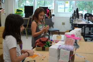 A group of girls decorate their "mini-mansions." (Photo by Janelle Clausen)
