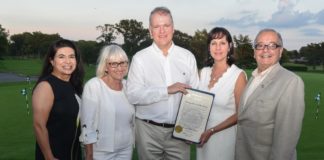 Town Councilwoman Anna M. Kaplan, Town Supervisor Judi Bosworth, and honorees Lori and Steve Scrobe with Assemblyman Anthony D’Urso. (Photo courtesy of Assemblyman Anthony D'Urso's office)
