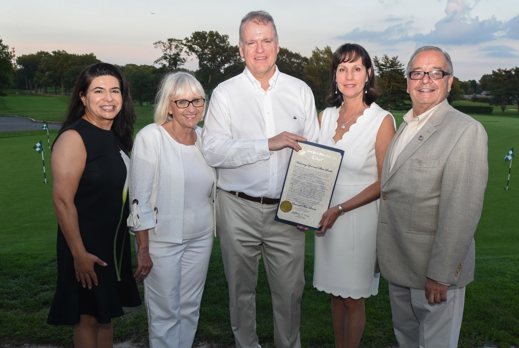 Town Councilwoman Anna M. Kaplan, Town Supervisor Judi Bosworth, and honorees Lori and Steve Scrobe with Assemblyman Anthony D’Urso. (Photo courtesy of Assemblyman Anthony D'Urso's office)