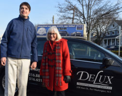 Kevin Greenstein speaks with North Hempstead Town Supervisor Judi Bosworth about the new taxi service for individuals with disabilities. Kevin’s Father, Larry Greenstein, is a member of the Town’s Disabilities Advisory Committee. (Photo courtesy of the Town of North Hempstead)