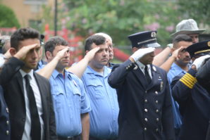 First responders salute those who gave all to save others on Sept. 11. (Photo by Janelle Clausen)