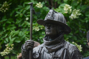 A statue of Jonathan L. Ielpi, a Great Neck resident, stands in the Firefighters Memorial Park named after him. (Photo by Janelle Clausen)