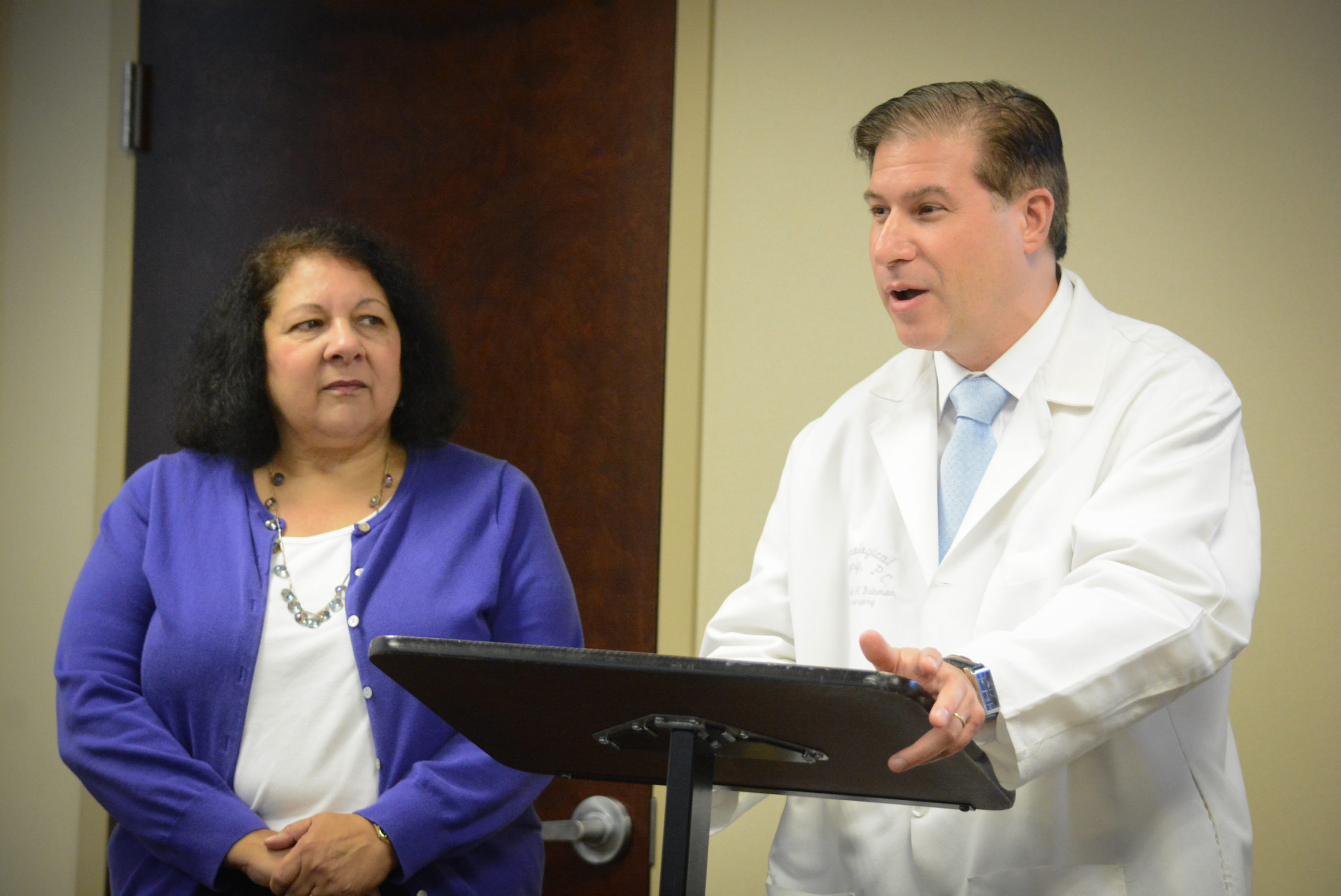 Dr. Michael Brisman, a neurosurgeon, and STEM education advocate Ray Ann Havasy announce the Neurological Surgery P.C. Health Science Competition. (Photo by Janelle Clausen)