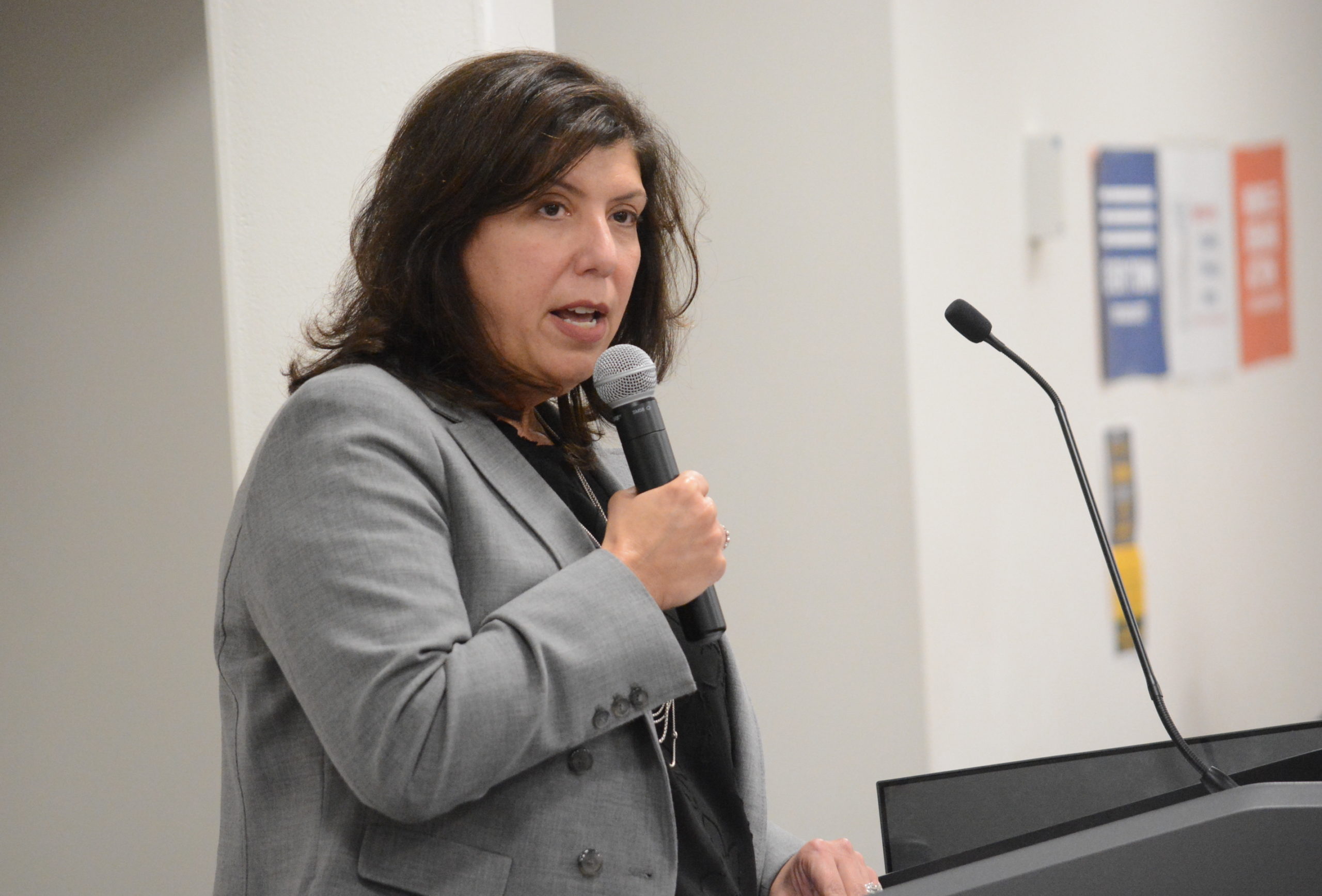 Nassau County DA Madeline Singas speaks to audience members at the gun violence prevention forum. (Photo by Janelle Clausen)