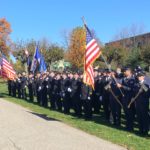 Members of Great Neck‘s fire departments marched in the Veterans Day parade and paid tribute to those who have served. (Photo by John Nugent)