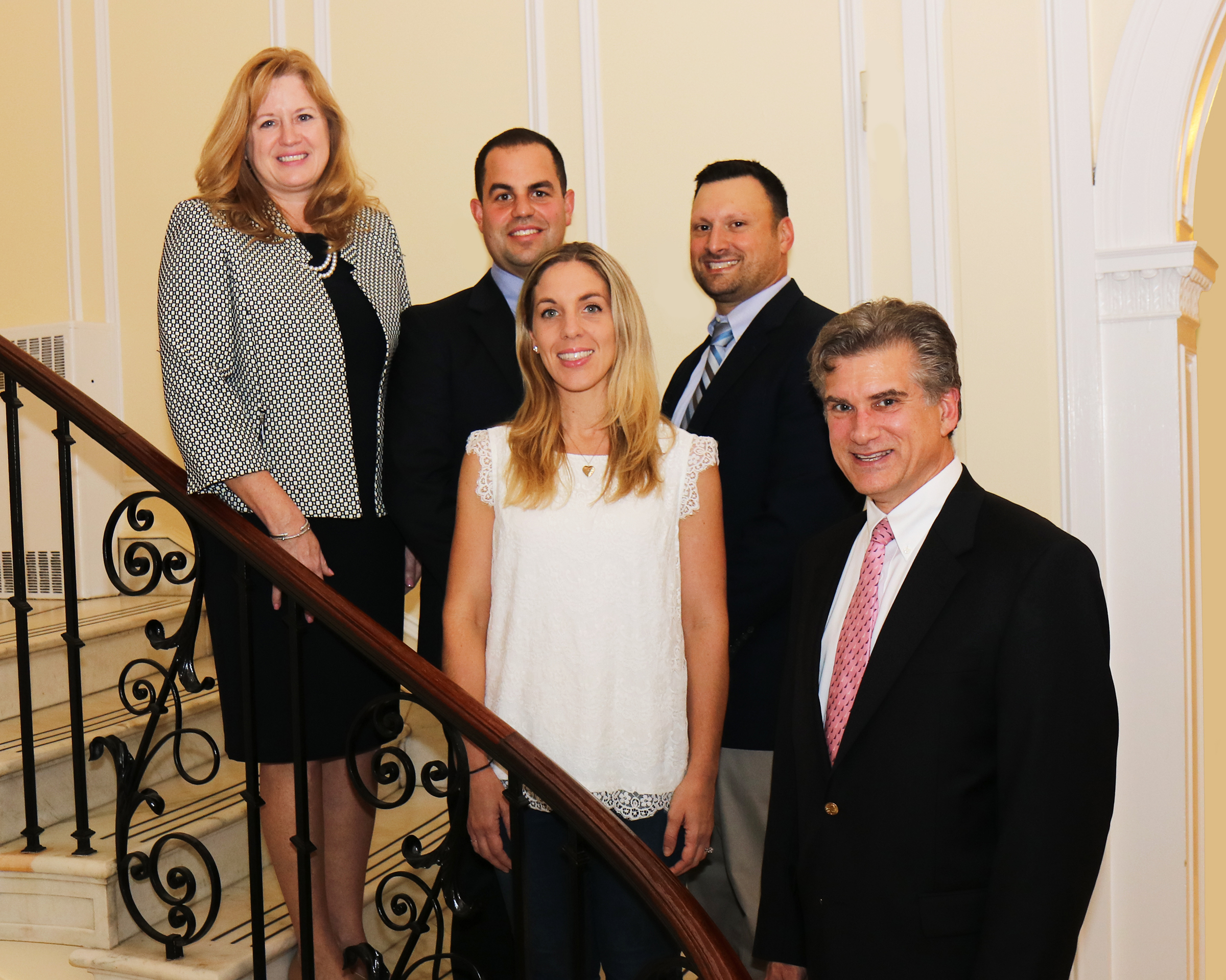 Superintendent of Schools Dr. Teresa Prendergast and Assistant Superintendent for Secondary Education Stephen Lando congratulate Tobias Hatten, Donna Plante, and Michael DiPasquale on their selection as Master Teachers. (Photo courtesy of the Great Neck Public Schools)