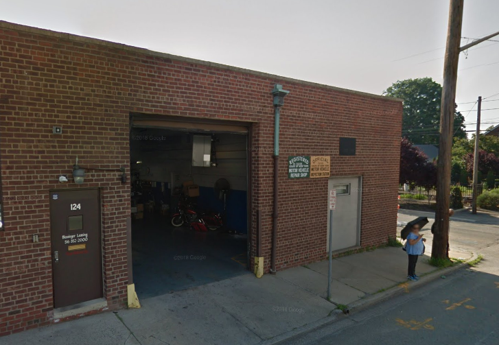 This building on Covert Avenue will be demolished as part of the Long Island Rail Road's third track project. (Photo from Google Maps)