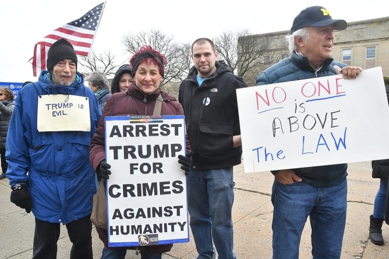 Presidents’ Day protesters call for Trump’s justification of national emergency