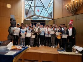Certificates of Achievement were awarded to eighteen 8th-graders of the North Shore Hebrew Academy and four alumni, who chanted Megillat Esther on Purim Day at the NSHA Cherry Lane campus for classmates, parents, grandparents, teachers and administrators. Head of School Rabbi Jeffrey Kobrin and Middle School Principal Rabbi Adam Acobas arranged for the Megillah readers to find time to prepare with instructor Paul Brody. (Photo by Ilana Kroll)