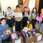 As part of the school’s Kindness Week activities, the Student Council and the JFK PTA sponsored a toy drive to benefit several children’s hospitals. (Photo courtesy of the Great Neck Public Schools)