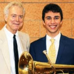 Omeed Tartak is photographed with Joseph Rutkowski, his instrumental music teacher at North High School. (Photo courtesy of the Great Neck Public Schools)