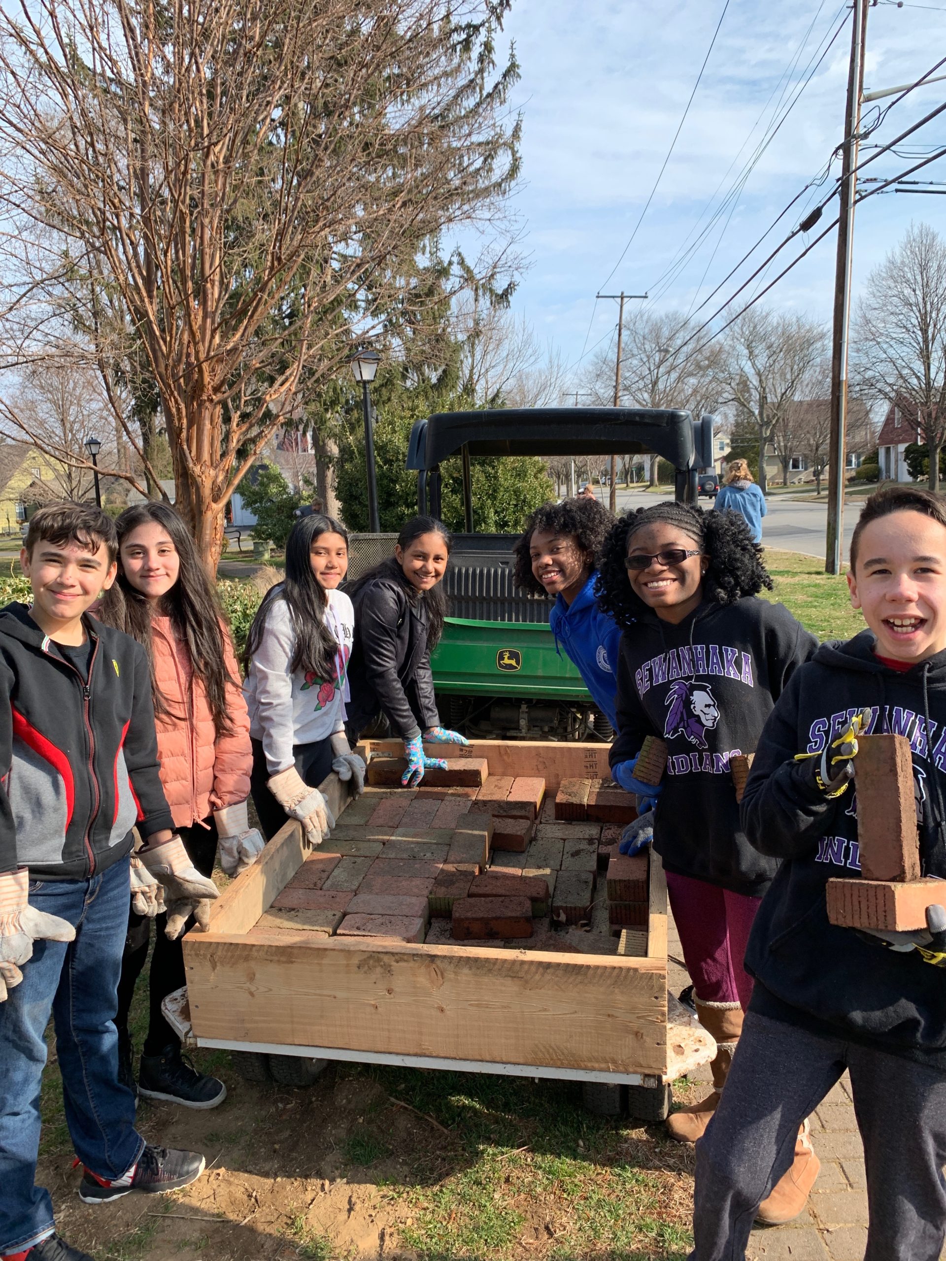 Students participated in beautifying three gardens at the Centennial Gardens.