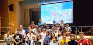 Representatives from the Viscardi School are photographed here with JFK Assistant Principal Michelle Bell, fifth-grade teacher Rebecca Schapira, and fourth and fifth-grade members of the JFK Student Council. (Photo courtesy of Great Neck Public Schools)