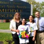 Jewels Rahmanan, wearing her winning t-shirt design for the 2019 Achilles Kids International Program, is photographed with North Middle School teachers Jeryl Lehmuller and Michelle Sicurella, and Principal Gerald Cozine. (Photo by Irwin Mendlinger)
